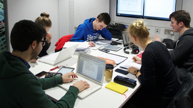 A group of students working on computers