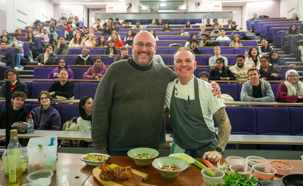 Picture of Rob Appleby and Simon Wood with students in the background