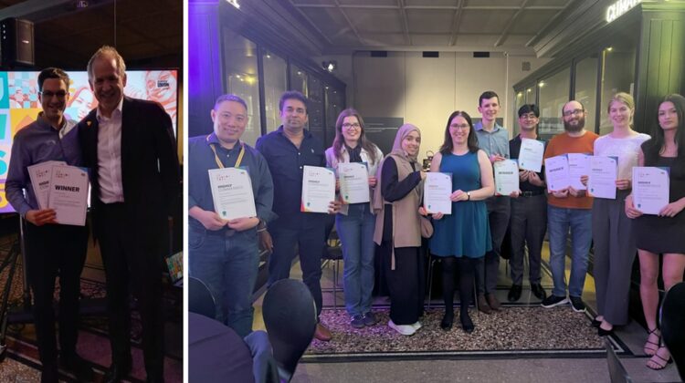 Image of people holding certificates at an awards ceremony